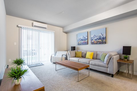 a living room with a couch and a coffee table